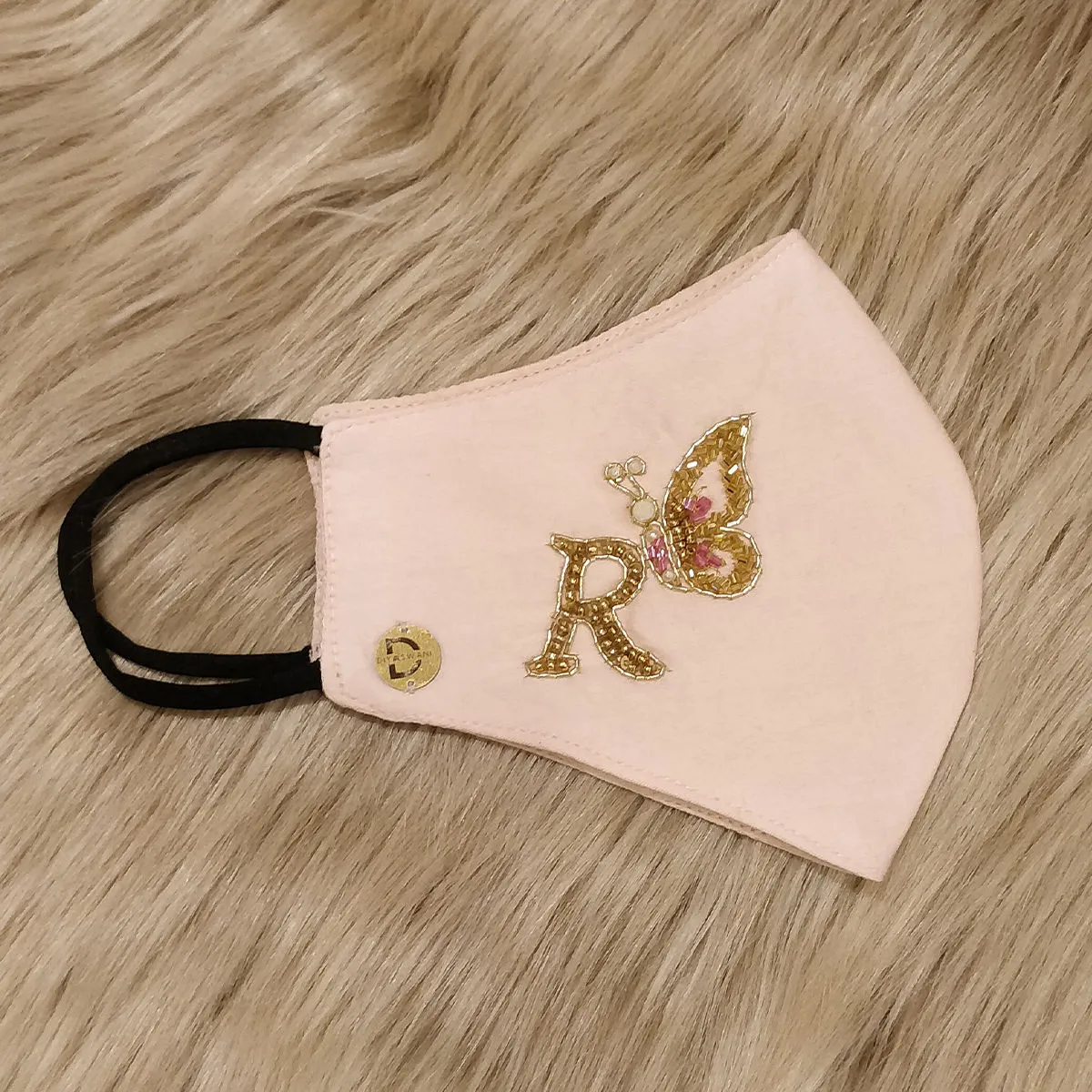 Diya Aswani Pink Personalised Mask Letter R With Butterfly