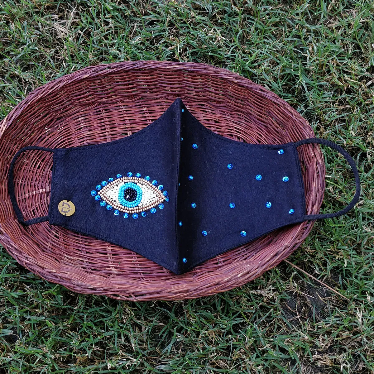 Diya Aswani Black Evil Eye Mask