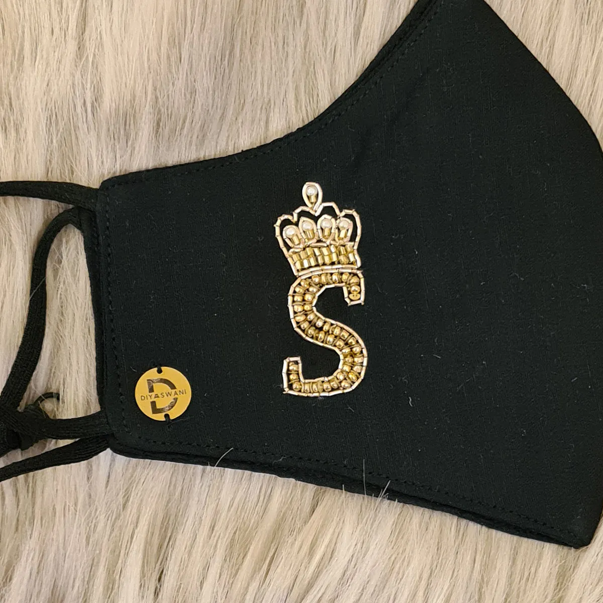 Diya Aswani Black Personalised Mask Letter S With King Crown