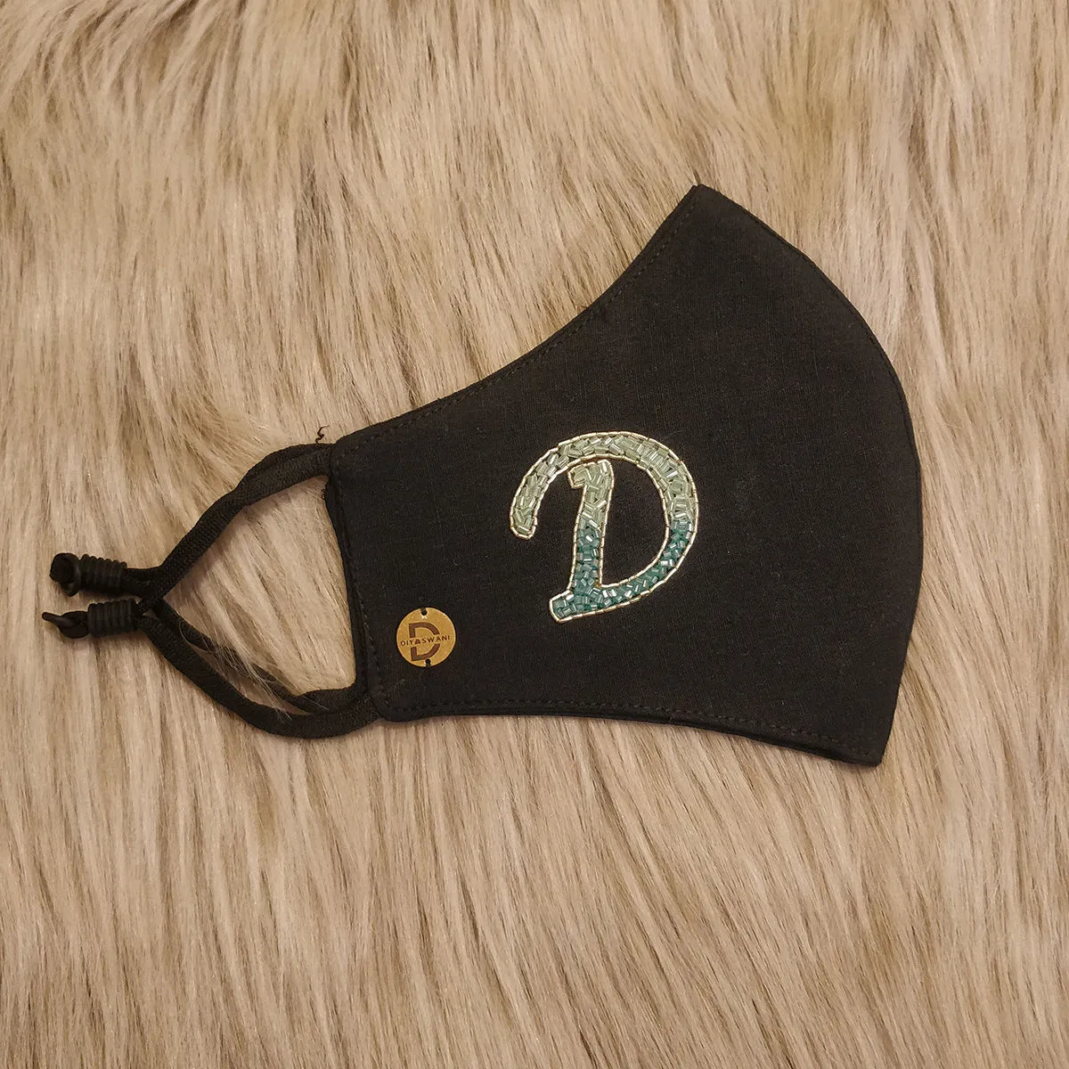 Diya Aswani Black Dual Tone Green Letter D Mask