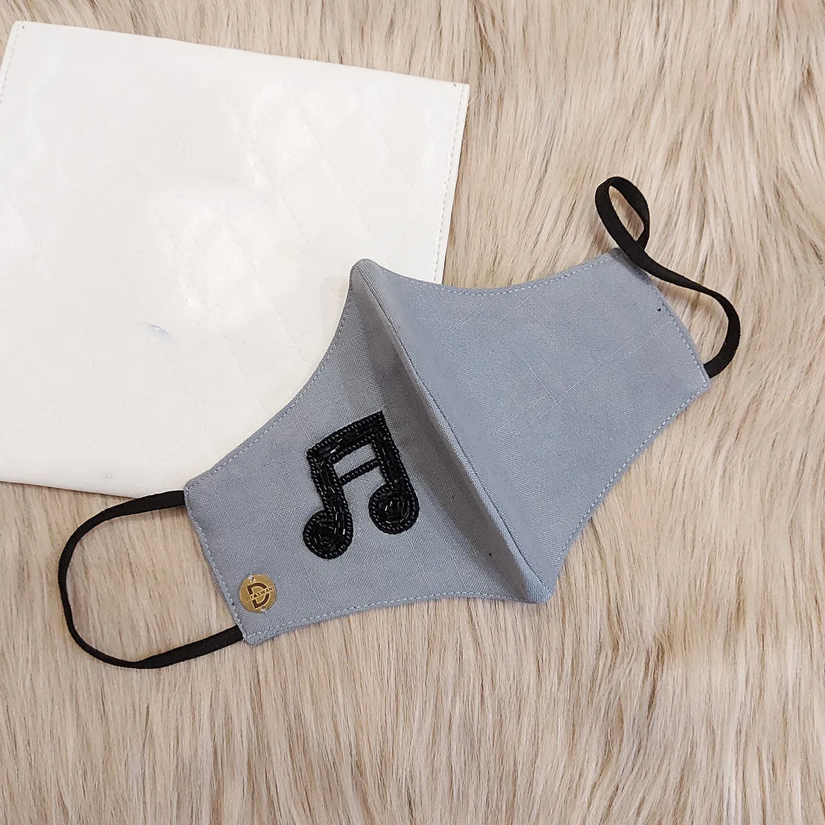 Diya Aswani Grey Music Note Mask