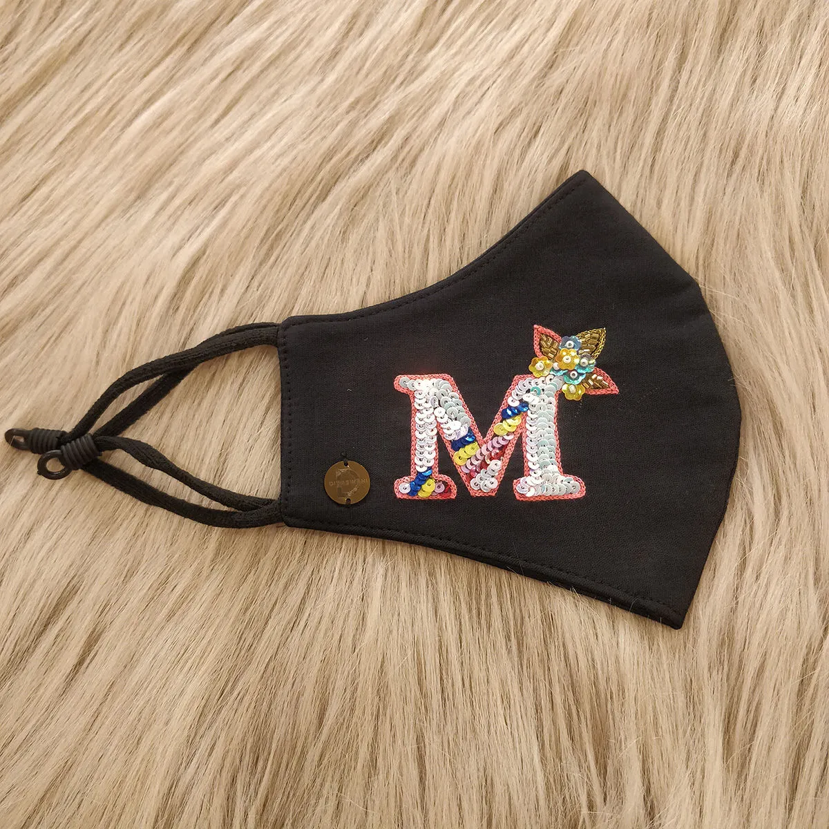 Diya Aswani Black Unicorn Themed Letter M With Flower Crown Mask