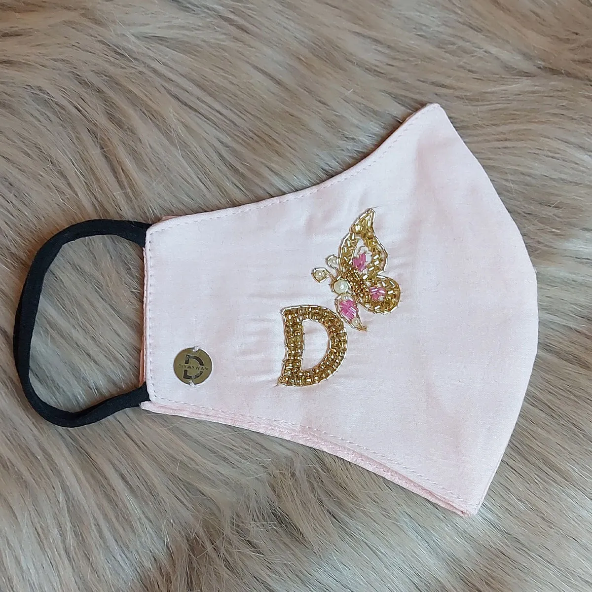 Diya Aswani Pink Personalised Mask Letter D With Butterfly